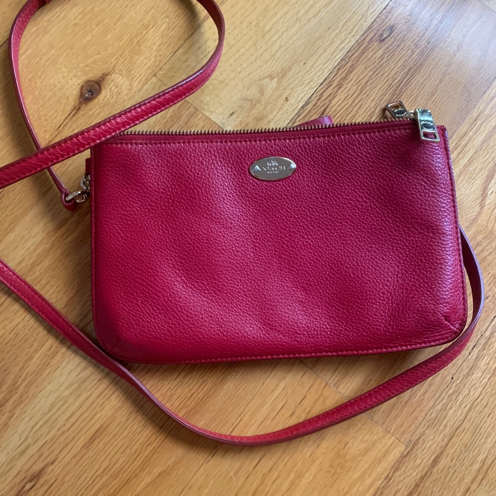 red COACH crossbody and clutch